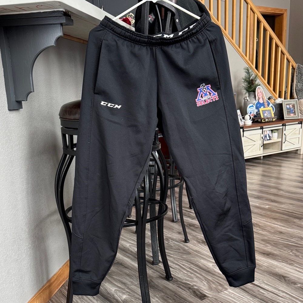 CCM Black Joggers with Vibrant Logo.  Worm once